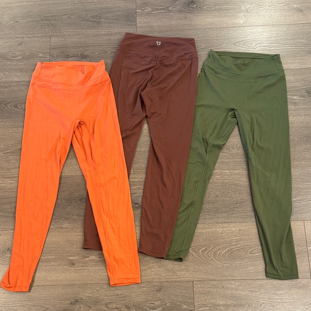3 Pairs of Leggings - Orange, Brown, and Green